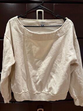 American Eagle Outfitters Off-the-Shoulder Sweatshirt in Cream